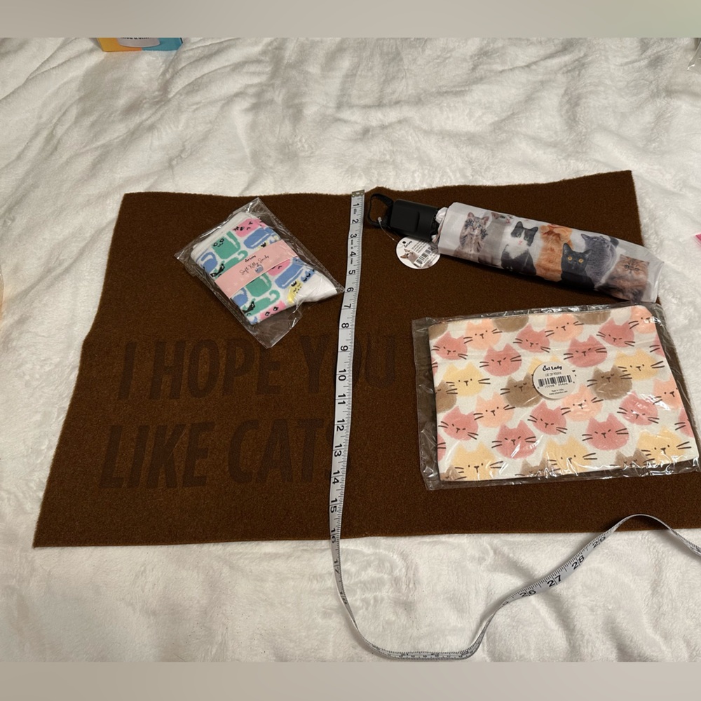 Brown Cat-Themed Mat with Accessories